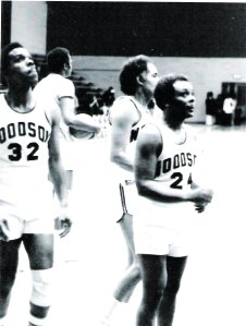 BILL KEEPS HIS EYES ON THE BALL